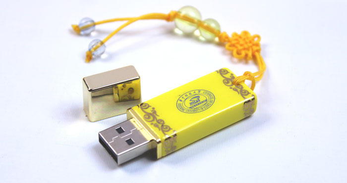 華中科技大學(xué)周年慶紀念禮品 帝王黃無(wú)線(xiàn)折鼠+黃瓷筆+u盤(pán)