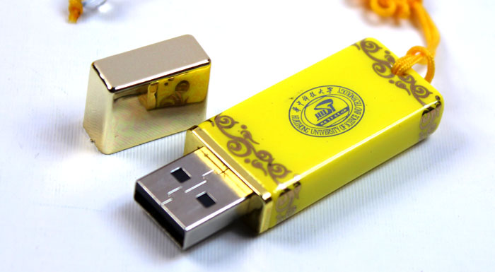 華中科技大學(xué)周年慶紀念禮品 帝王黃無(wú)線(xiàn)折鼠+黃瓷筆+u盤(pán)